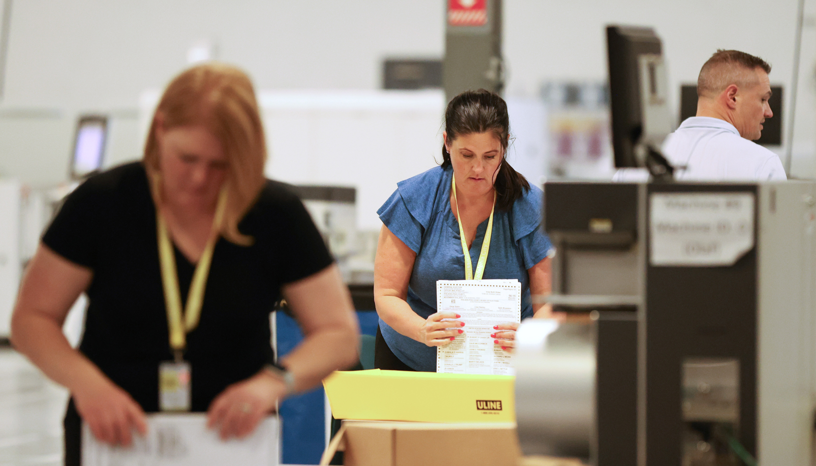 Election workers doing their jobs